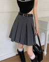 A classic pleated skirt featuring a high waist and knee-length design