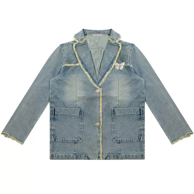 A distressed denim blazer featuring a charming butterfly pin and frayed edges. This jacket includes large front pockets and a lapel collar, perfect for adding a vintage and grunge touch to any outfit