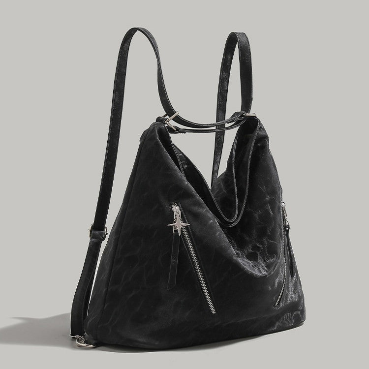 Aesthetic shoulder bag in black with a sleek design and front zipper &amp; stars detail - boogzel clothing