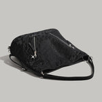 Aesthetic shoulder bag in black with a sleek design and front zipper &amp; stars detail - boogzel clothing