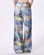 These blue wide-leg pants featuring a dreamy sky print with angelic cats, styled as cherubs - boogzel clothing