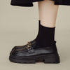 Black leather preppy loafers featuring a chunky sole and a gleaming silver chain across the vamp -  boogzel clothing