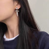 bow pendant pearl earrings boogzel clothing