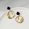 moon stone earrings boogzel apparel