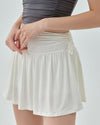 mini tennis skirt in white - white  tennis skirt - boogzel tennis goods