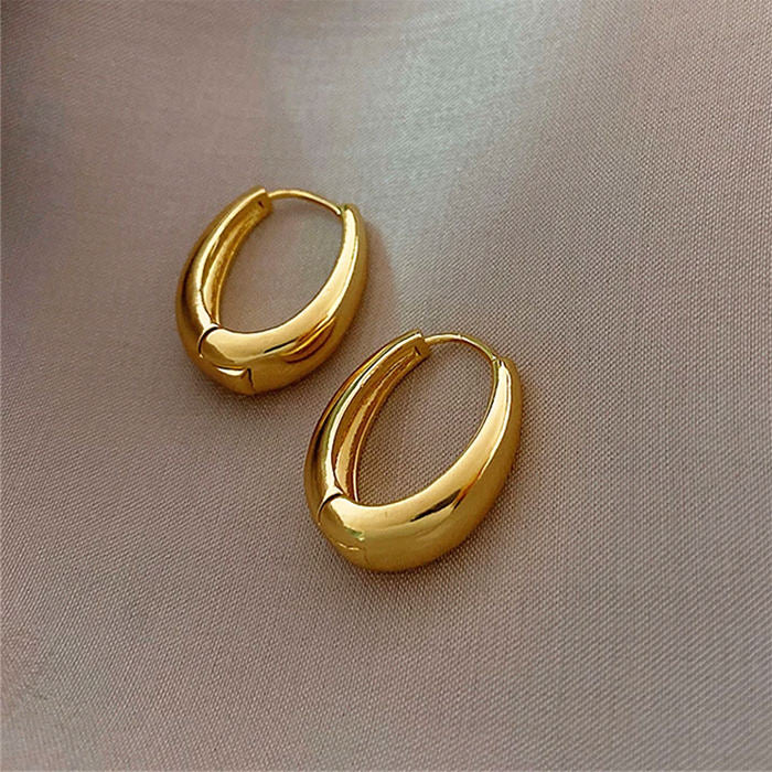 gold hoop earrings boogzel apparel