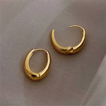 golden hoop earrings boogzel apparel