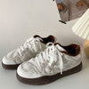 Minimalist Aesthetic Soft white Sneakers boogzel clothing