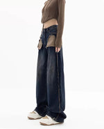 These Canyon Town Cowboy Jeans have a wide-leg cut, large contrasting front pockets, and frayed side details