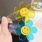 smile face emoji hair clip boogzel apparel