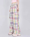 Soft girl aesthetic cargo pants in pastel plaid. Designed with an oversized fit and multiple pockets