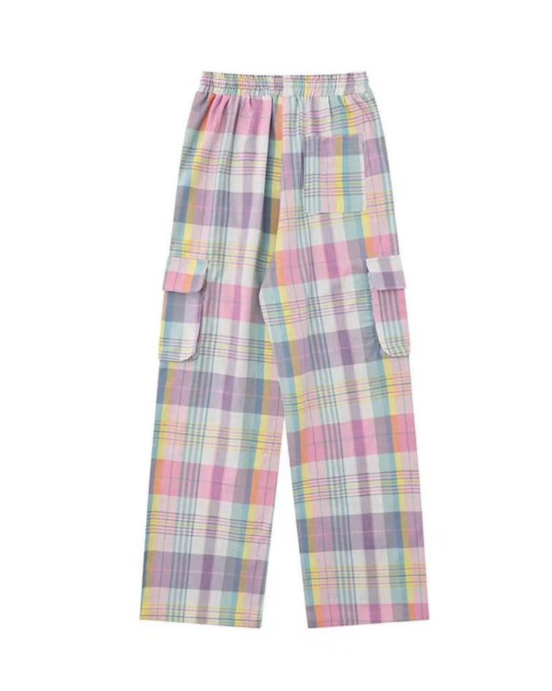 Soft girl aesthetic cargo pants in pastel plaid. Designed with an oversized fit and multiple pockets