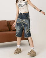 Dark wash denim shorts featuring a unique star-shaped distressed design with frayed edges. These high-waisted shorts blend a classic style with an edgy aesthetic