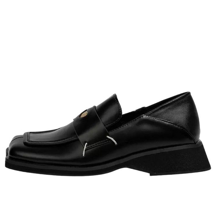 The Futuristic Platform Loafers feature a sleek black design with a high platform sole - Boogzel Clothing