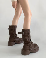 These stylish slouchy leather boots feature a soft, relaxed construction with a comfortable platform sole and buckle strap detailing at the side - boogzel clothing