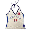 This Nostalgic France Halter Tank brings back 90s fashion with "FRANCE" lettering and a French shield emblem. The halter neck design is perfect for a retro aesthetic look