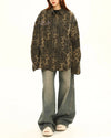 This 90's style leopard denim jacket features a rhinestone star on the chest and button-up construction -boogzel clothing