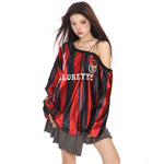 This oversized jersey features a striped pattern, off-shoulder cut, and "Blokette" text across the front - boogzel clothing