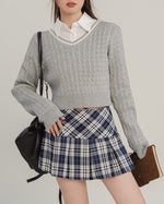 This preppy aesthetic mini skirt features a high waist, pleated design and classic plaid pattern - boogzel clothing