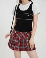 This preppy aesthetic mini skirt features a high waist, pleated design and classic plaid pattern - boogzel clothing