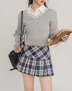 This preppy aesthetic mini skirt features a high waist, pleated design and classic plaid pattern - boogzel clothing