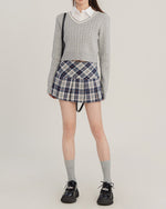 This preppy aesthetic mini skirt features a high waist, pleated design and classic plaid pattern - boogzel clothing