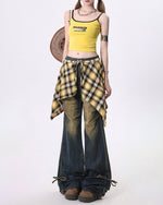 Wide-leg flared jeans with a distressed finish, featuring a yellow plaid shirt-tie detail around the waist - boogzel clothing