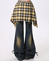 Wide-leg flared jeans with a distressed finish, featuring a yellow plaid shirt-tie detail around the waist - boogzel clothing