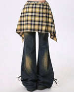 Wide-leg flared jeans with a distressed finish, featuring a yellow plaid shirt-tie detail around the waist - boogzel clothing