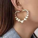 gold heart earrings boogzel apparel