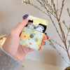 yellow floral print airpods case boogzel apparel