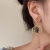 aesthetic asymmetrical earrings boogzel clothing