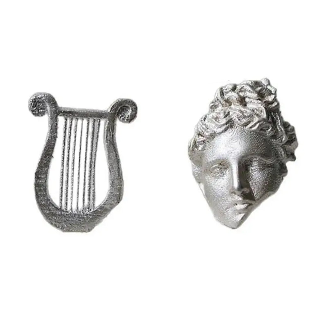 apollo lyre asymmetrical earrings boogzel clothing