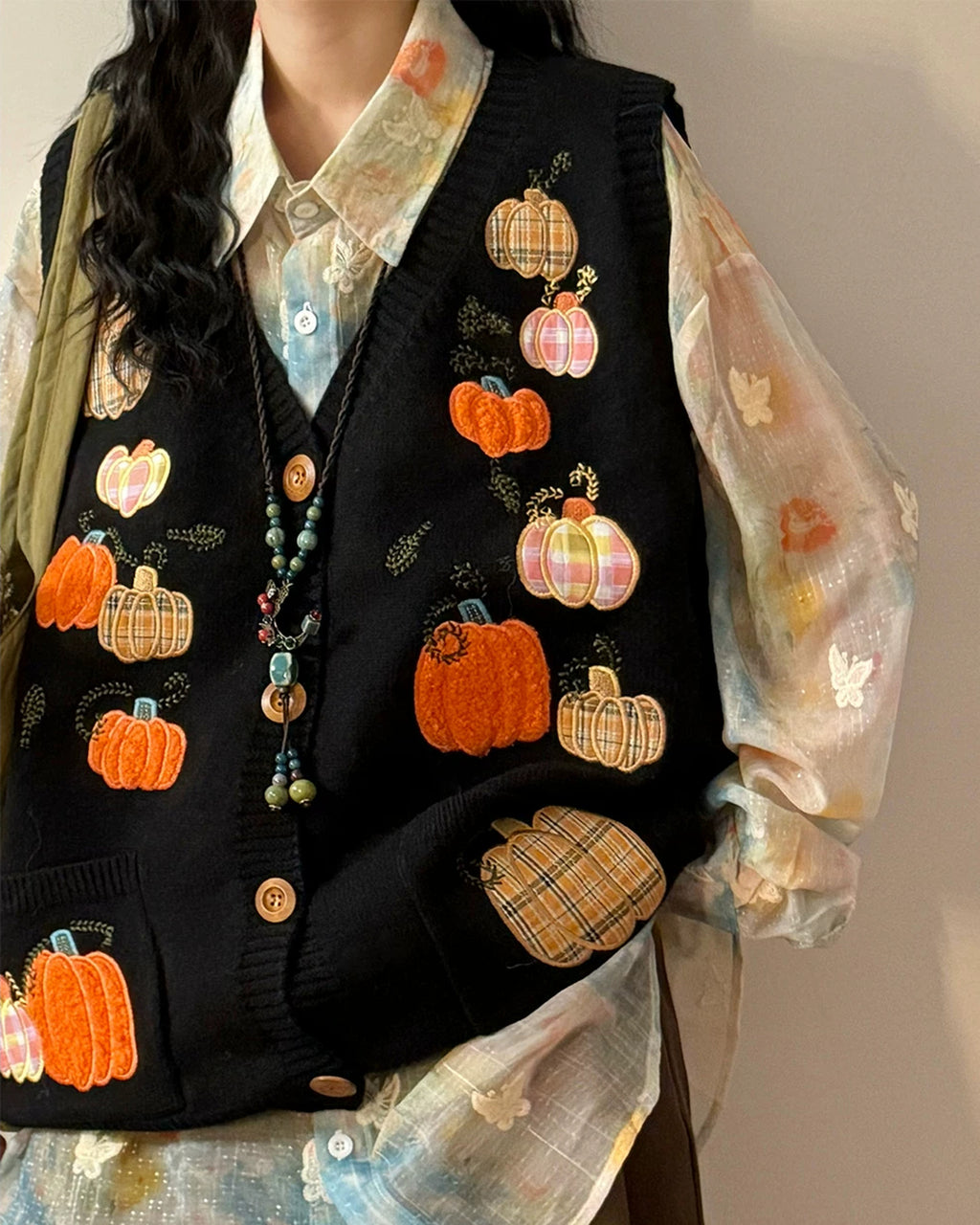 black_pumpkin_applique_cardigan_vest_fall_sweater_vest_flat_lay