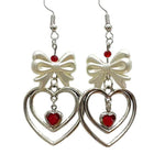 bow and heart coquette earrings boogzel clothing