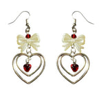 bow and heart coquette earrings boogzel clothing