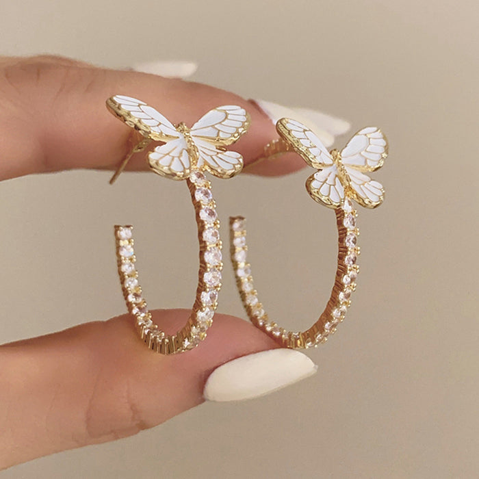 butterfly crystal hoop earrings boogzel clothing