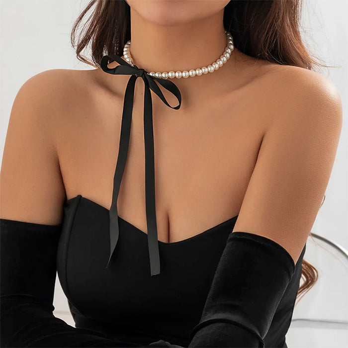 coquette bow pearl necklace boogzel clothing
