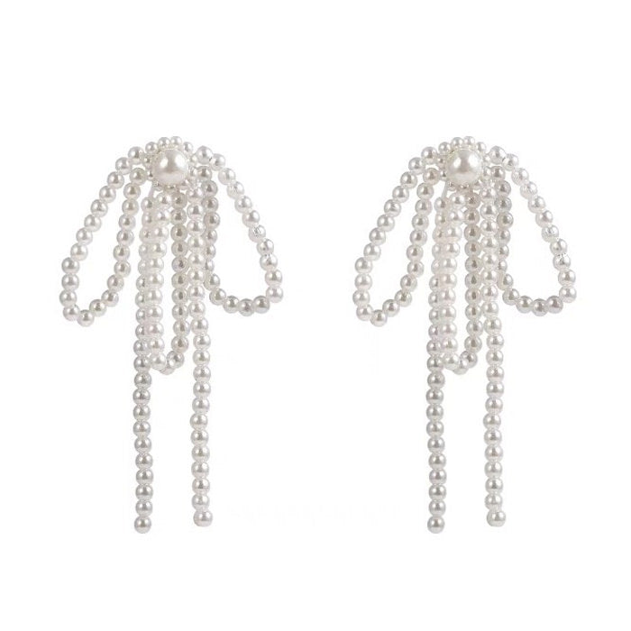 coquette bow pearl tassel earrings boogzel clothing