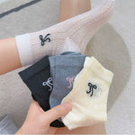 coquette bow print socks boogzel clothing