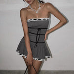 gray coquette dress features ribbed construction and black ribbons with bows - Boogzel Clothing