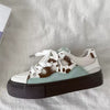 cow print skater sneakers boogzel clothing