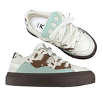 cow print skater sneakers boogzel clothing