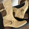 cream cowboy boots with buckle straps boogzel clothing