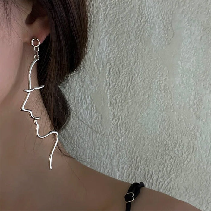 face outline earrings boogzel clothing