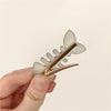 fish bone mini hair clip boogzel clothing