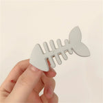 fish bone mini hair clip boogzel clothing