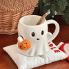 ghost with pumpkin ceramic mug boogzel clothing
