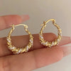 golden hoop aesthetic earrings boogzel clothing