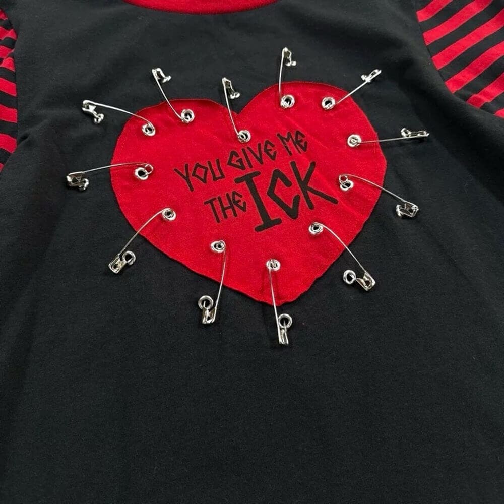 heartbreaker striped sleeve top boogzel clothing